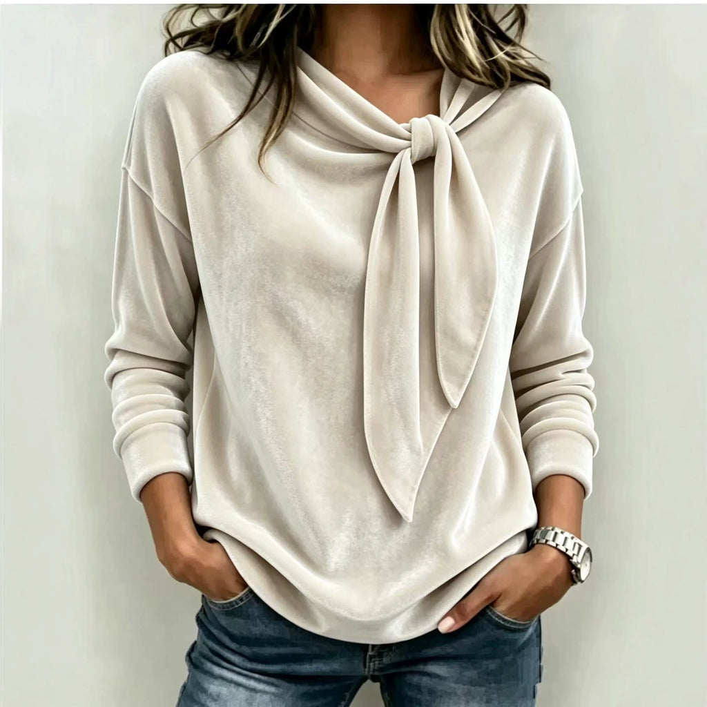 Solid color long sleeved bow top