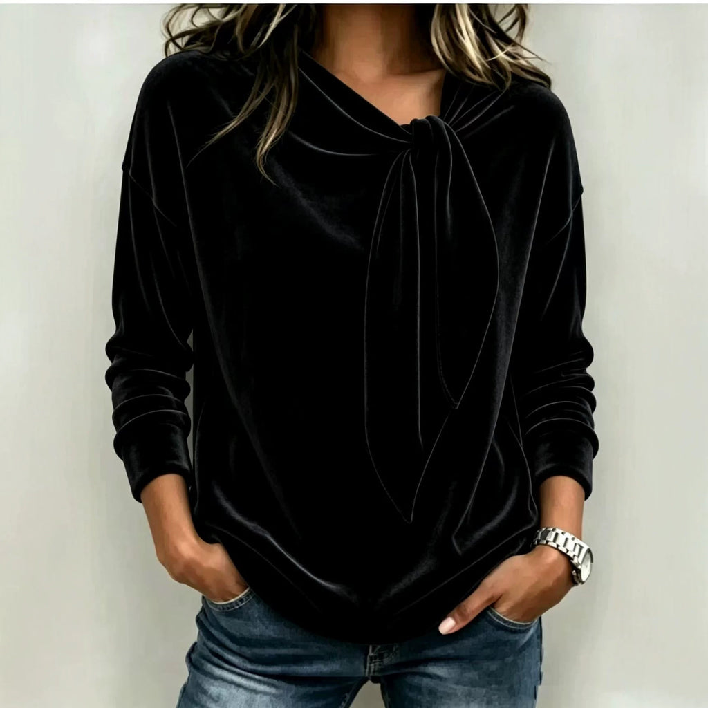 Solid color long sleeved bow top